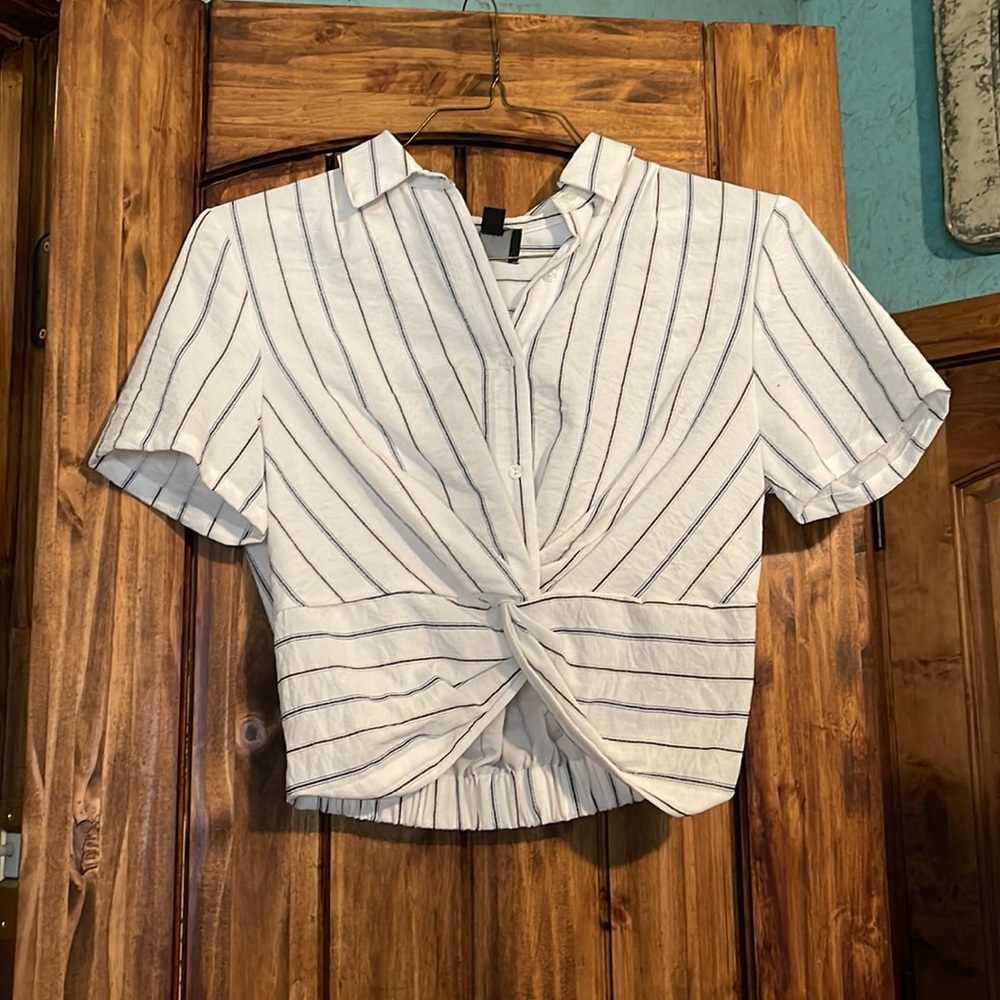 Large cropped collared shirt.